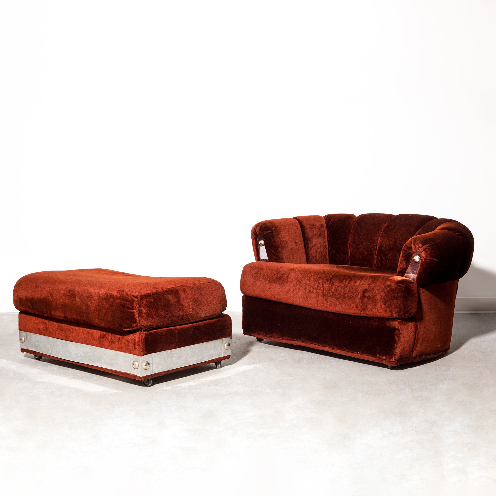 Vintage mid-century modern velvet armchair and ottoman