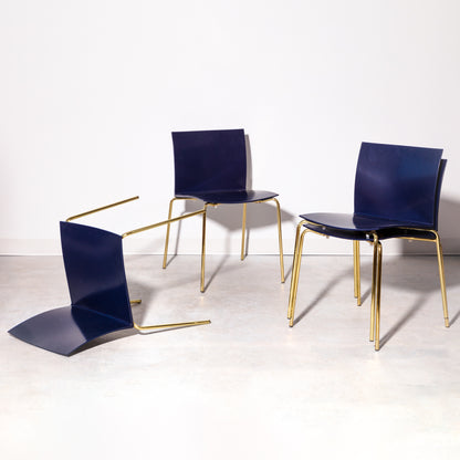CB2 Set of 4 Dining chairs with gold-toned steel legs