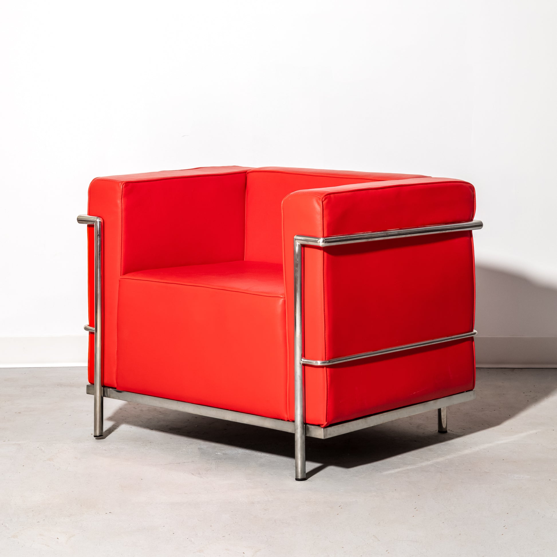 Red Le Corbusier style armchair