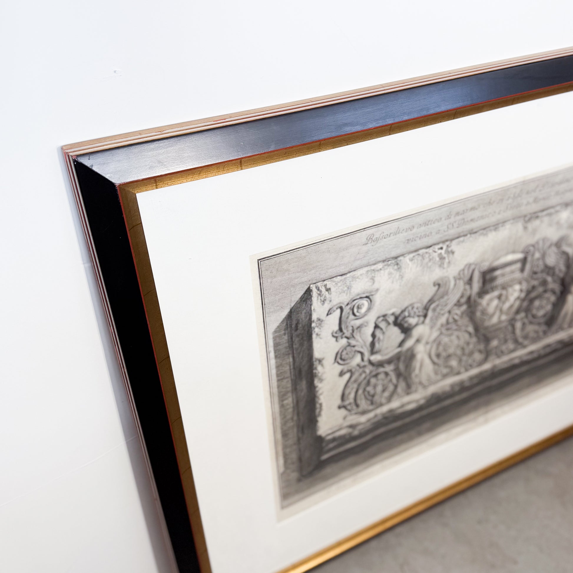 Framed artwork with decorative border on a white background