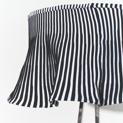 Black and white striped skirt on a white background