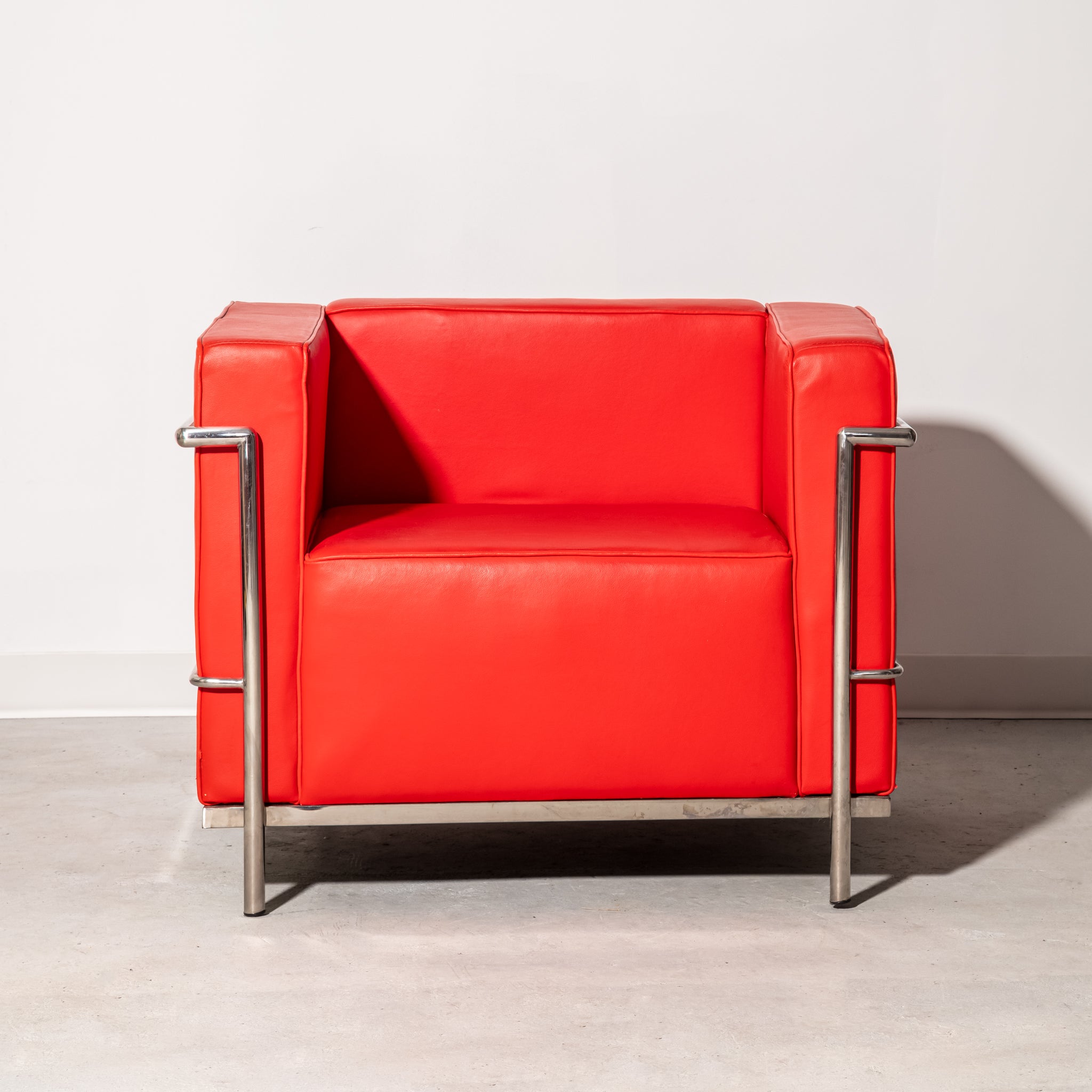 Red Le Corbusier style armchair