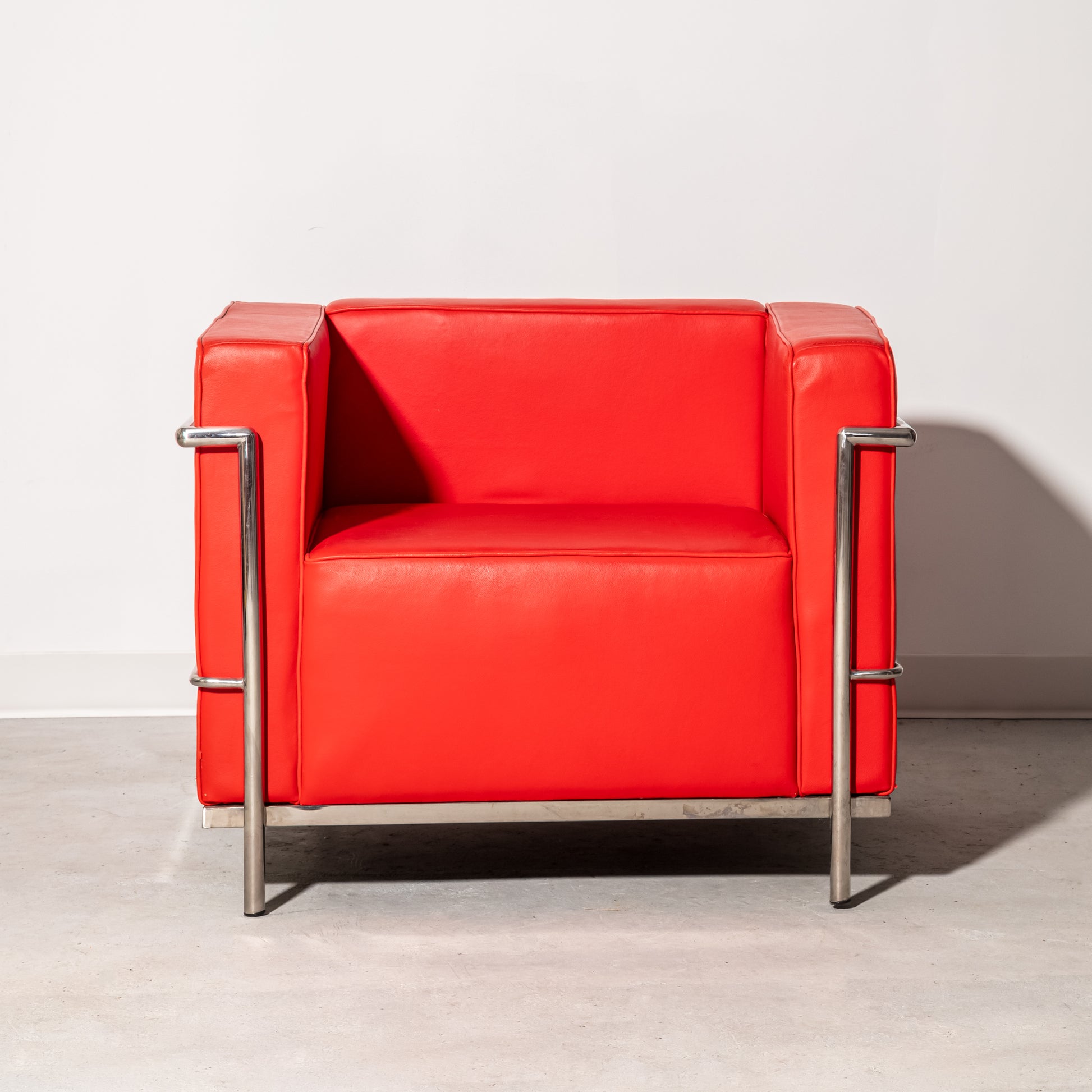 Red Le Corbusier style armchair