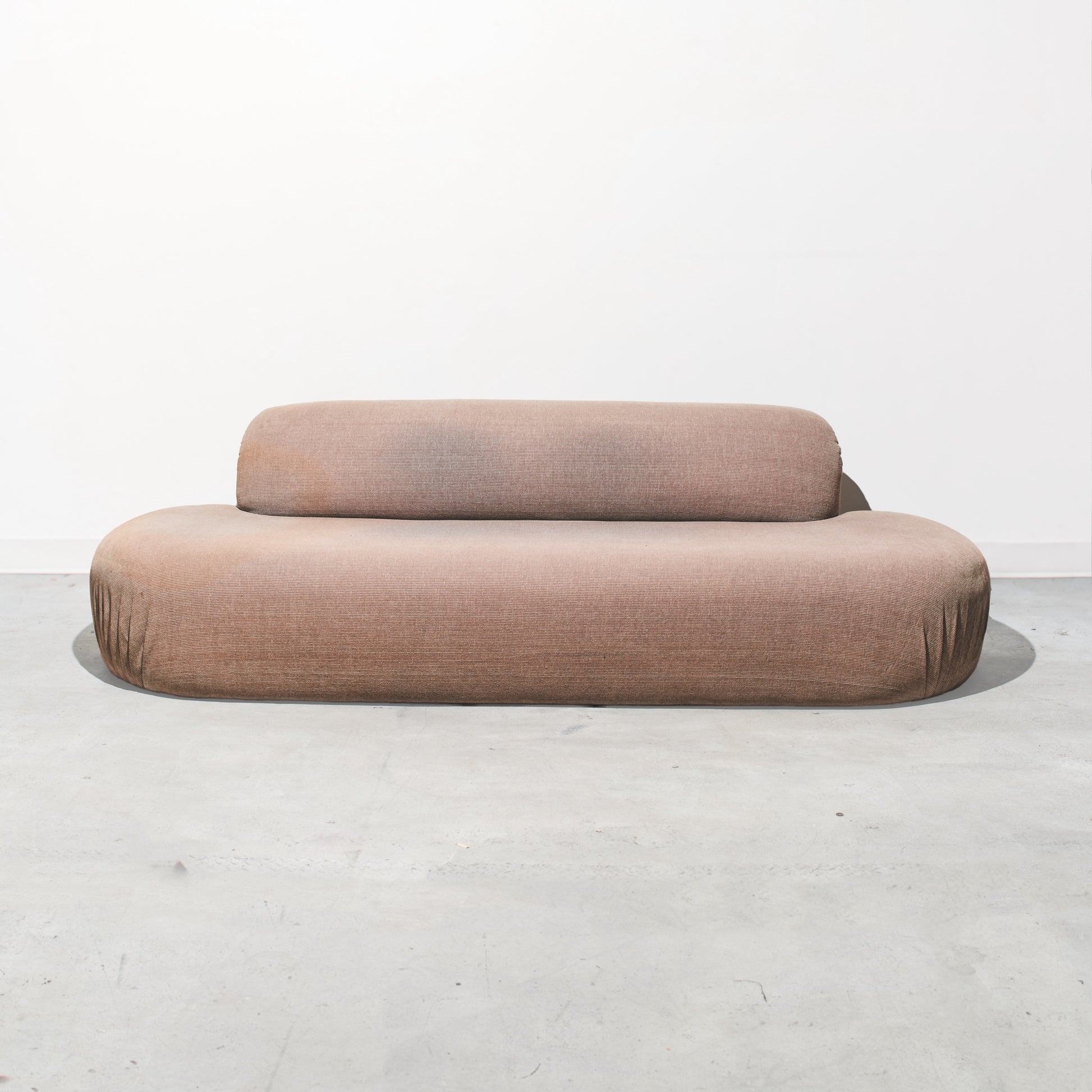 Beige sofa on a white background