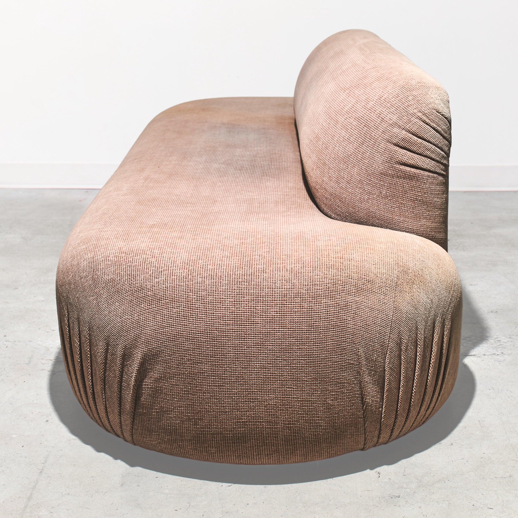 Brown textured chair on a light gray background