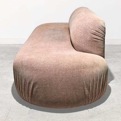 Brown textured chair on a light gray background