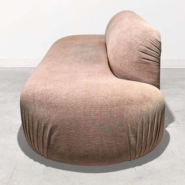 Brown textured chair on a light gray background